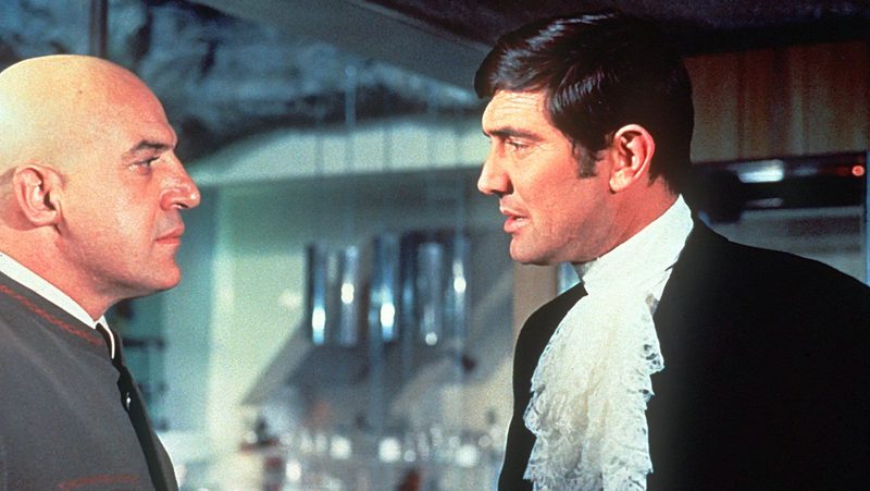 George Lazenby as James Bond.