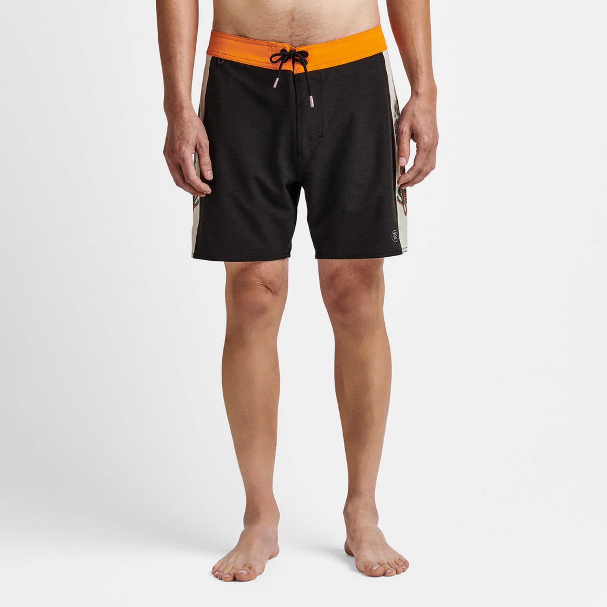 Man wearing Hokkaido Tiger Club collection board shorts from Roark