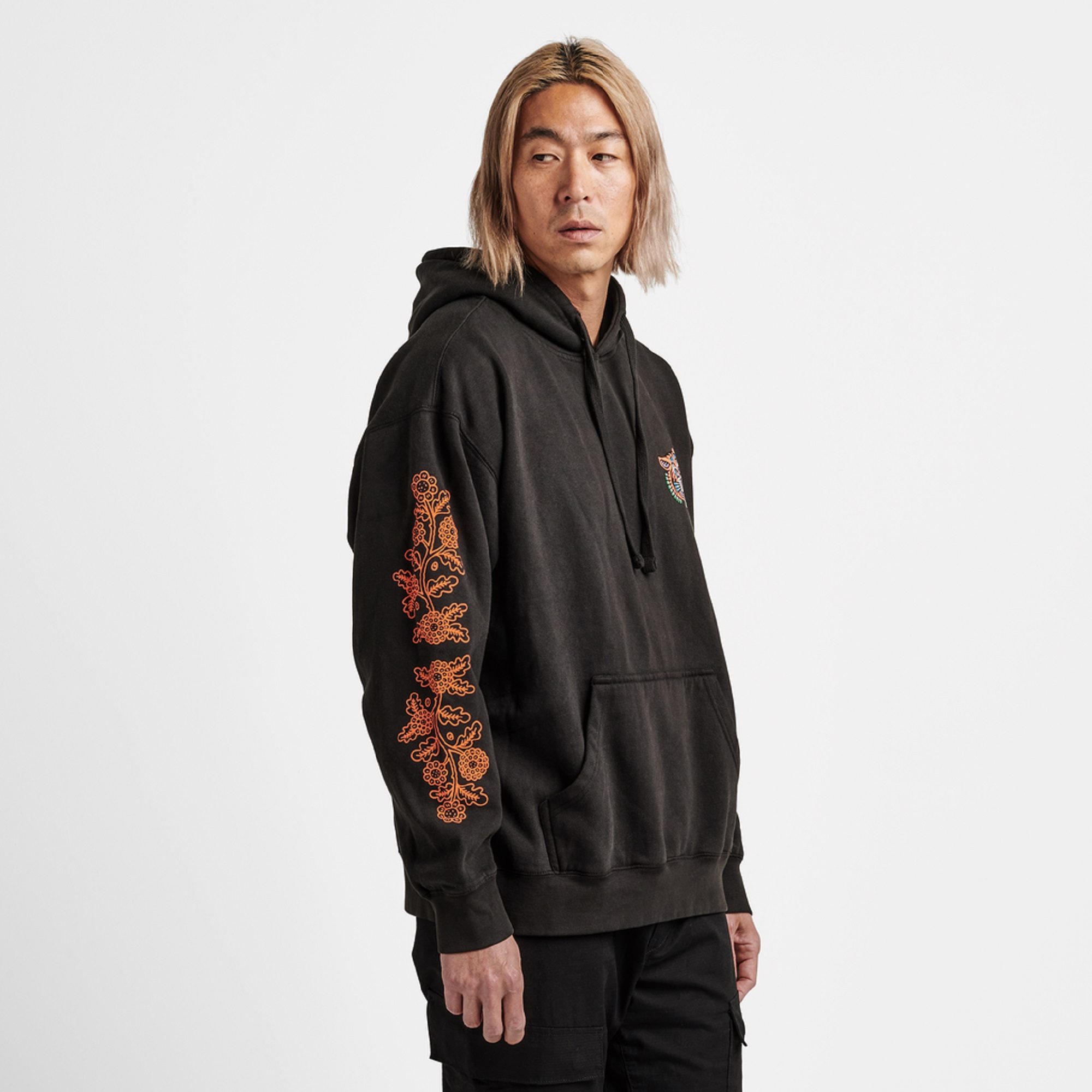 Man wearing a Hokkaido Tiger Club hoodie from Roark