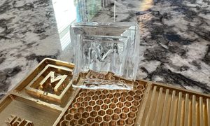 Clear ice with The Manual logo