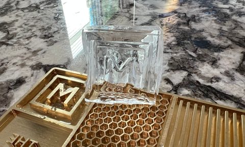 Clear ice with The Manual logo