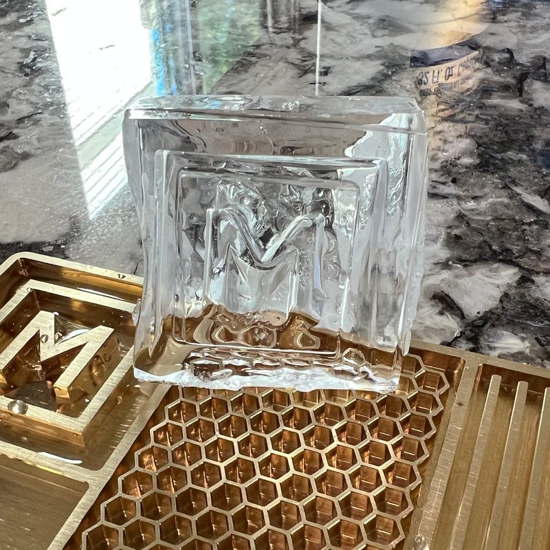 Clear ice with The Manual logo