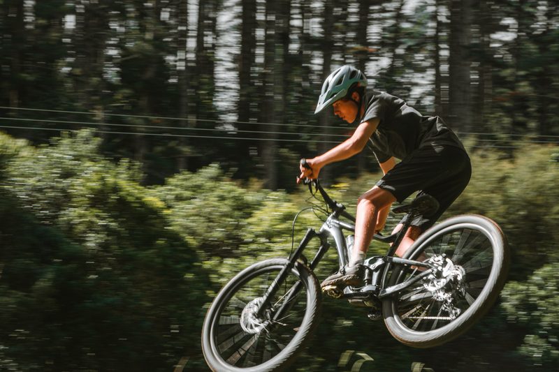 A mountain biker catches air