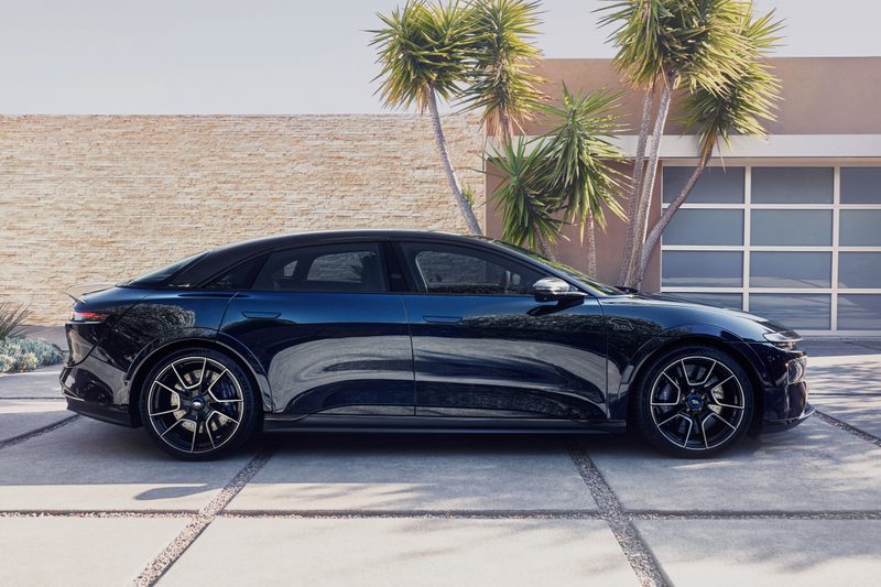 Lucid Air Sapphire parked in front of a house