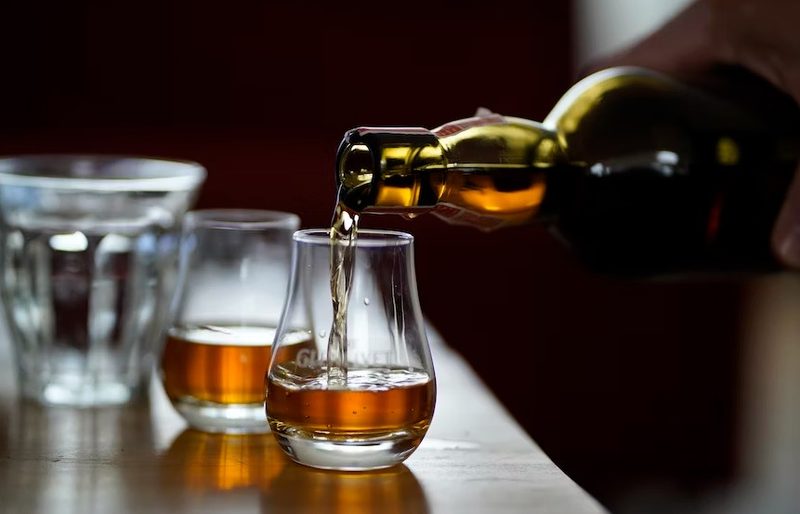 Pouring whiskey