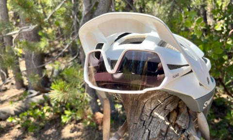 A picture of the Smith Shift MAG sunglasses with a Smith helmet