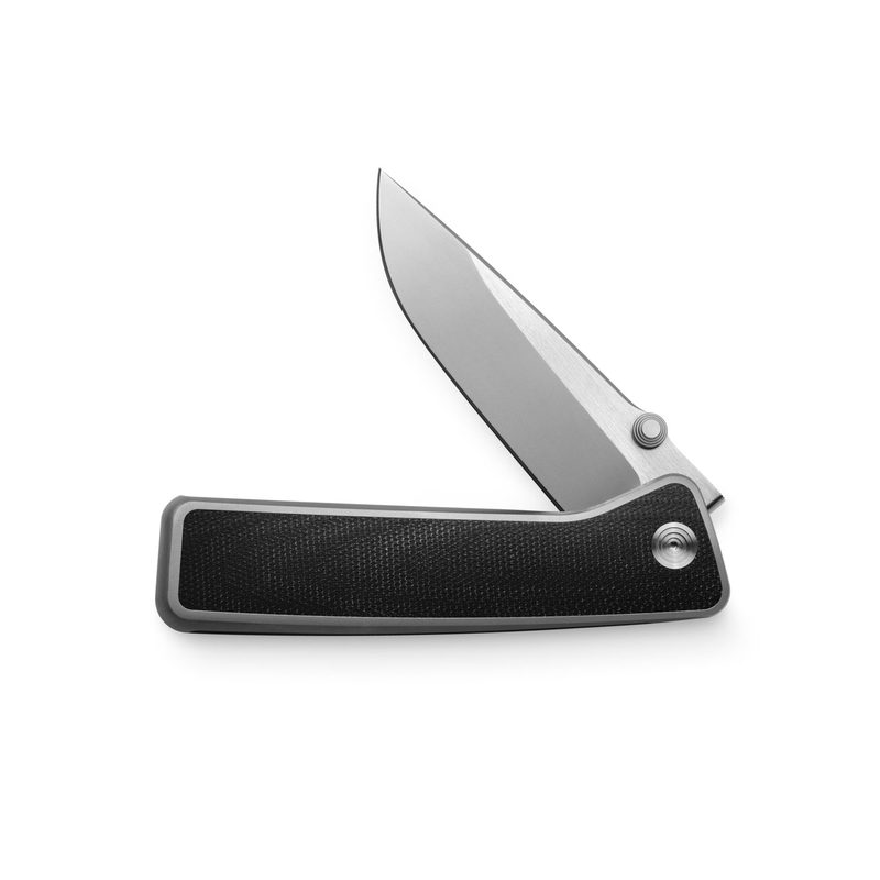 The James Barnes Micarta knife, open on a white background.