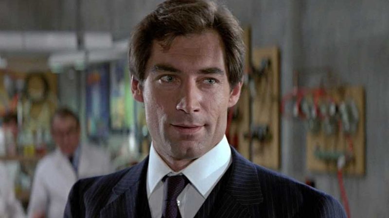 Timothy Dalton in a suit as James Bond.