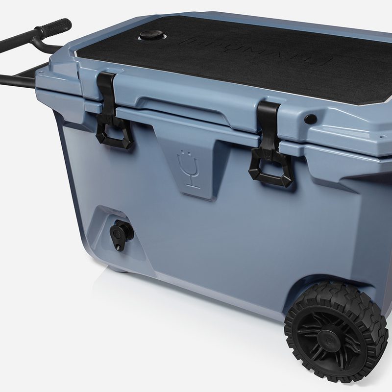 BruMate BruTank 55-Quart Rolling Cooler (in Denim blue) on a plain white background.