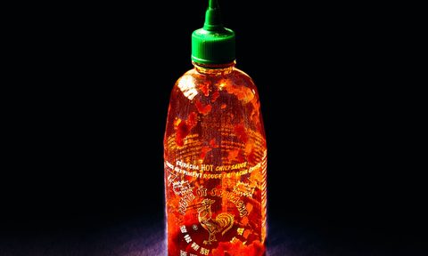 Empty sriacha bottle