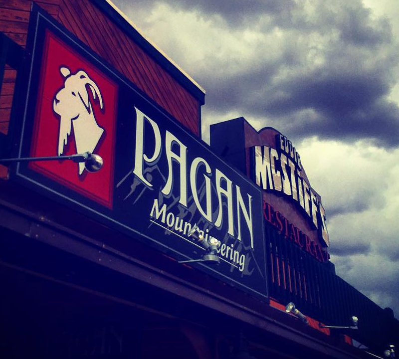 Sign over the front entrance at Pagan Mountaineering in Moab, Utah.