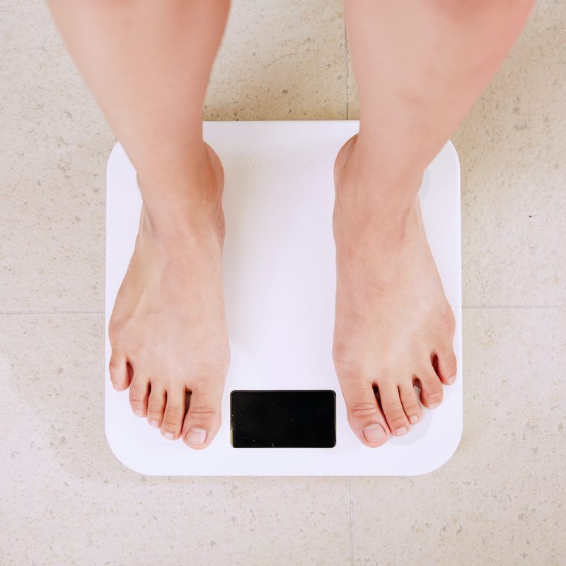 Feet on bathroom scale