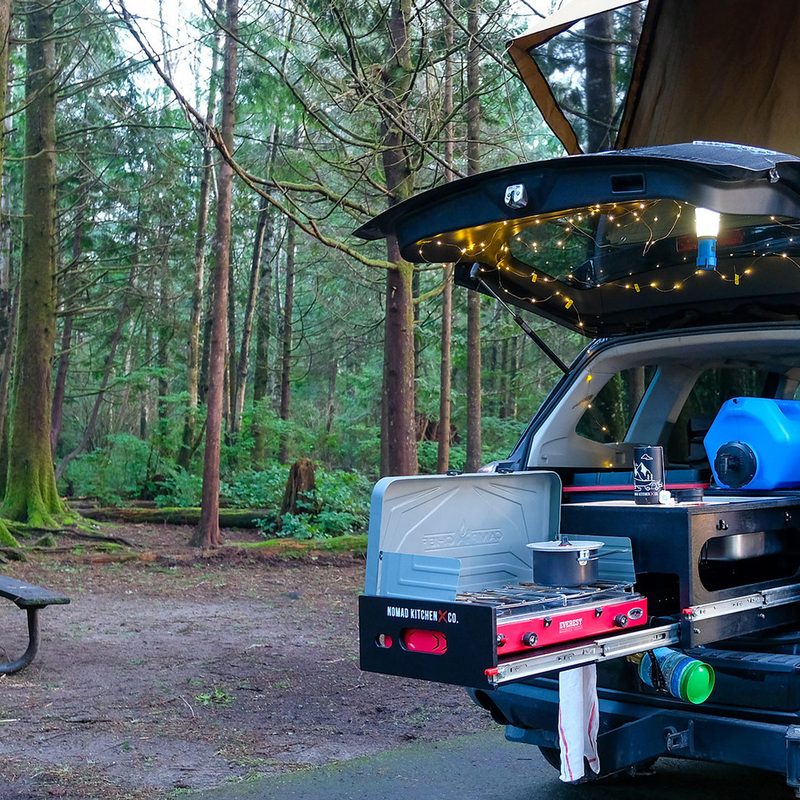 Nomad Kitchen Company's Original Nomad Kitchen expanded out from an  SUV camping in the woods.