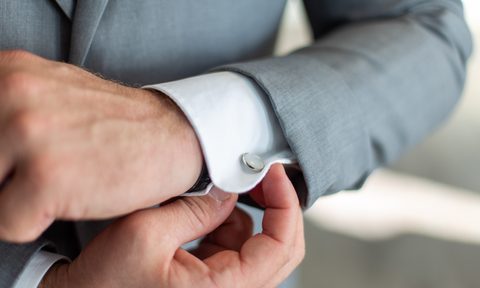 Closeup of blue cufflinks