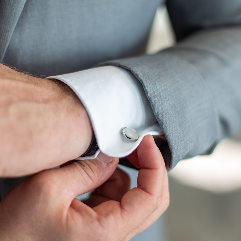 Closeup of blue cufflinks