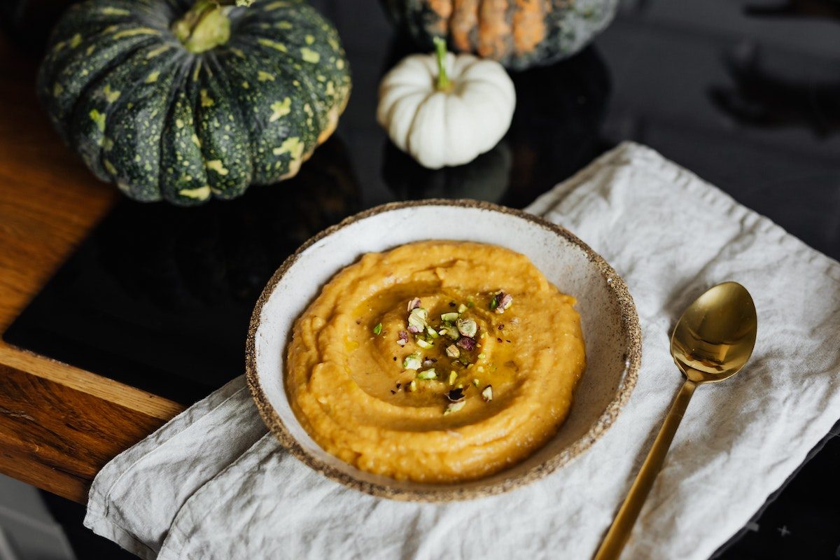 pumpkin soup on white napkin