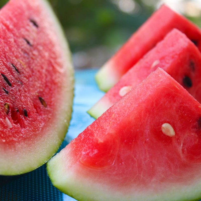 Sliced watermelon on a cutting board