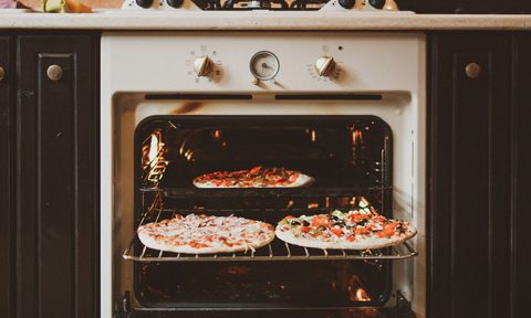 Pizzas on oven racks