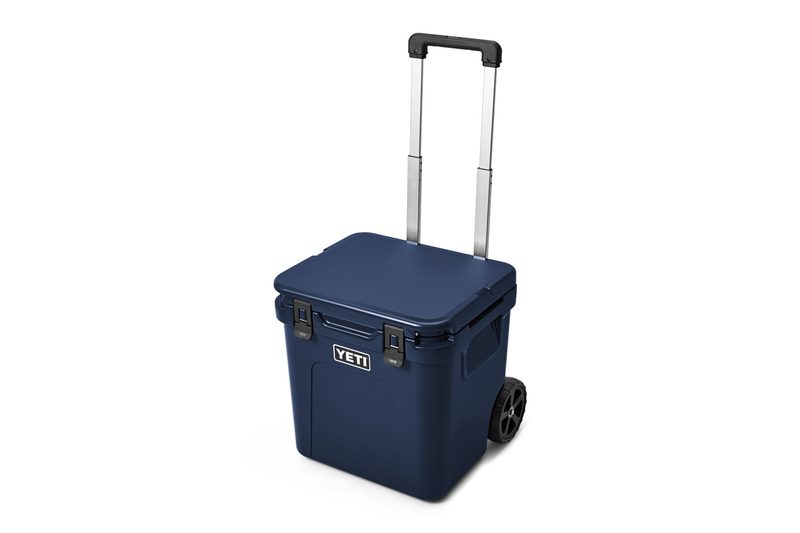 Yeti Roadie 48 Wheeled Cooler (in blue) on a plain white studio background.