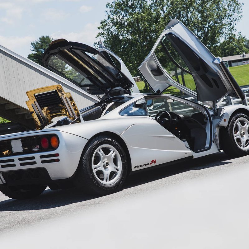 1995 McLaren F1 rear 3/4 view open doors engine bay
