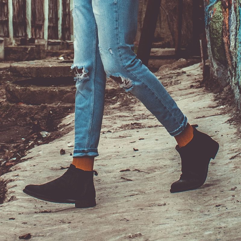 Black Chelsea boots with jeans