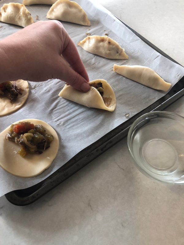 Assembling empanadas