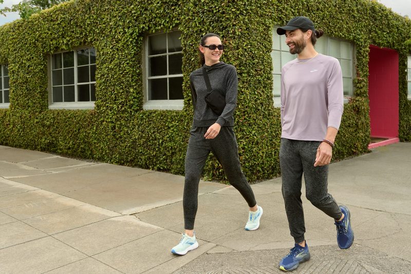 Two people walking on the street in Luxe