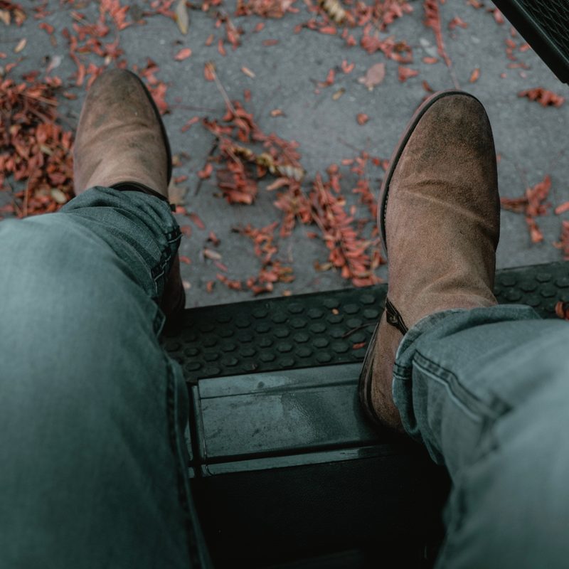 Man wearing brown Chelseas