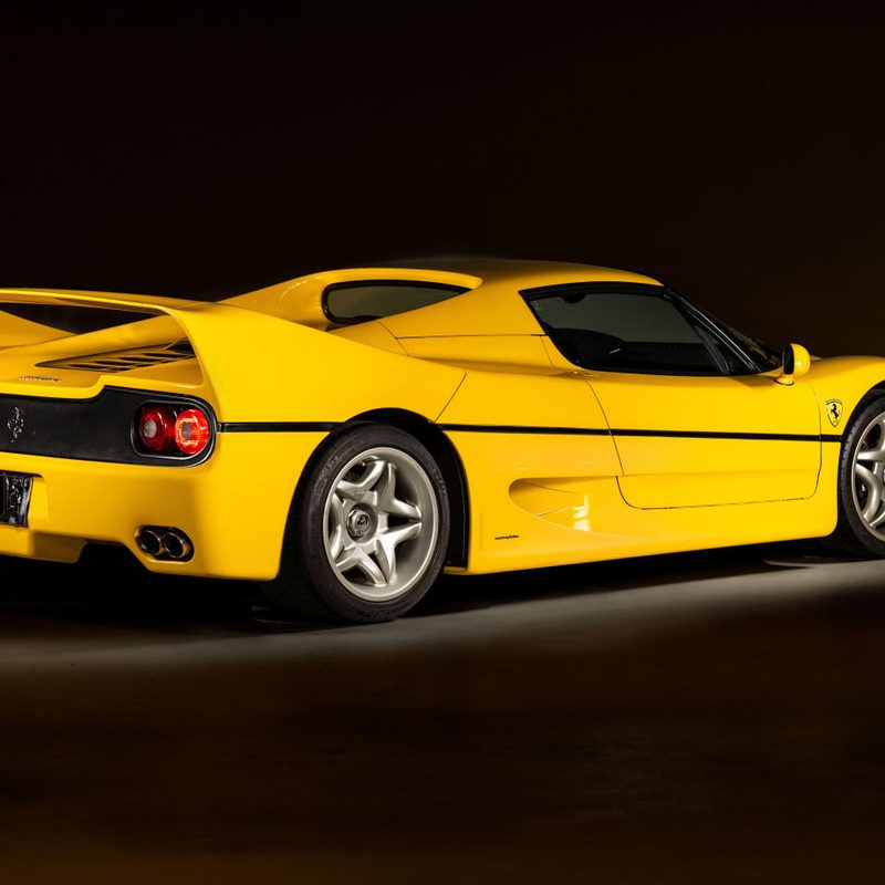 1997 Ferrari F50 rear 3/4 view yellow