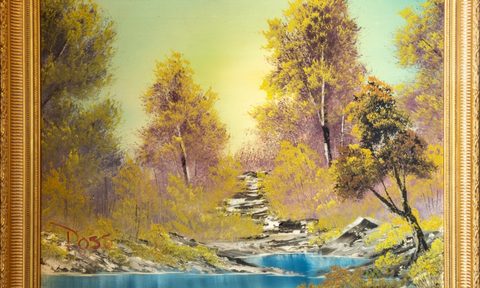 A close up of the first painting Bob Ross painted on his TV show.
