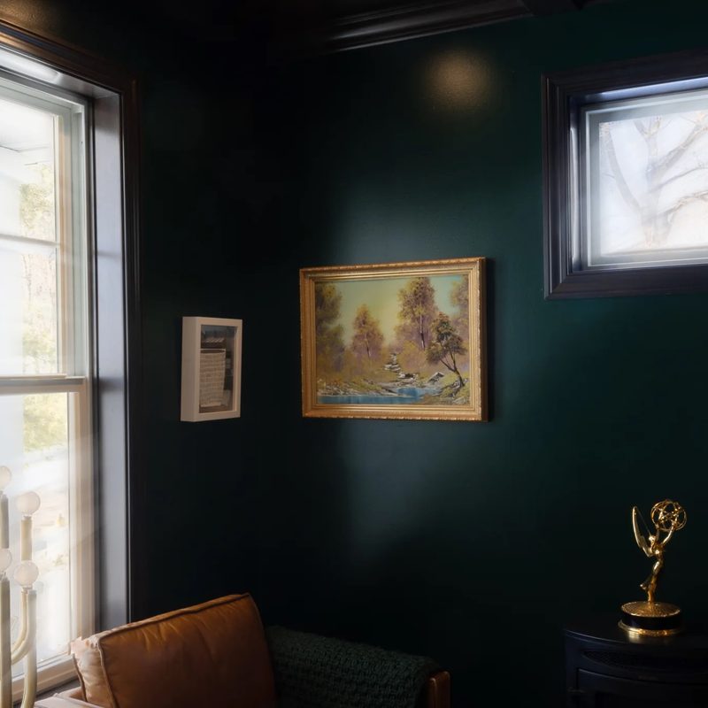 The first painting Bob Ross did on his TV show hanging up.