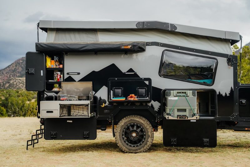 Clever outdoor kitchen of the Boreas Campers EOS-12 off-grid camper trailer.