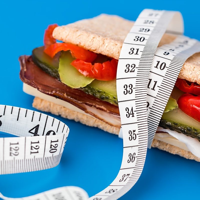 Sandwich wrapped in measuring tape