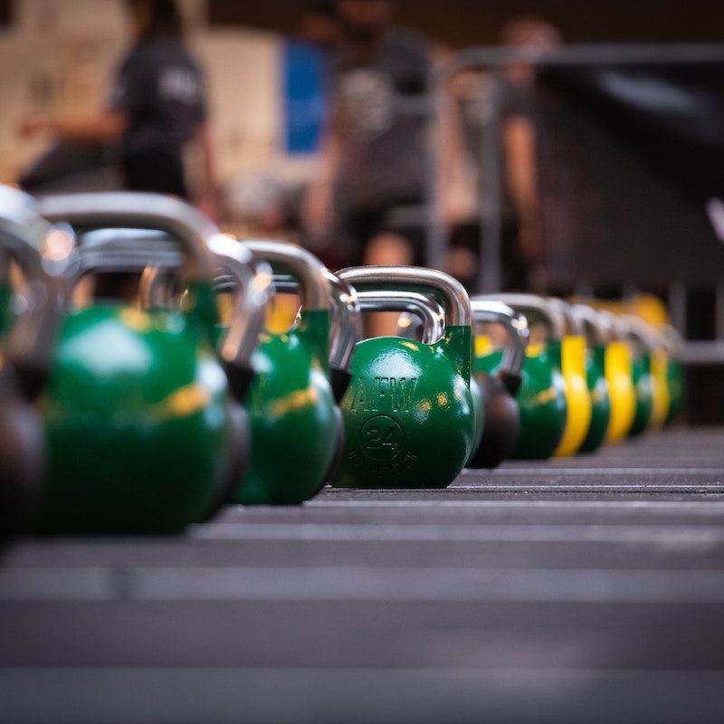 Green kettlebells at the gym