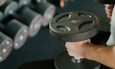 Man holding a dumbbell