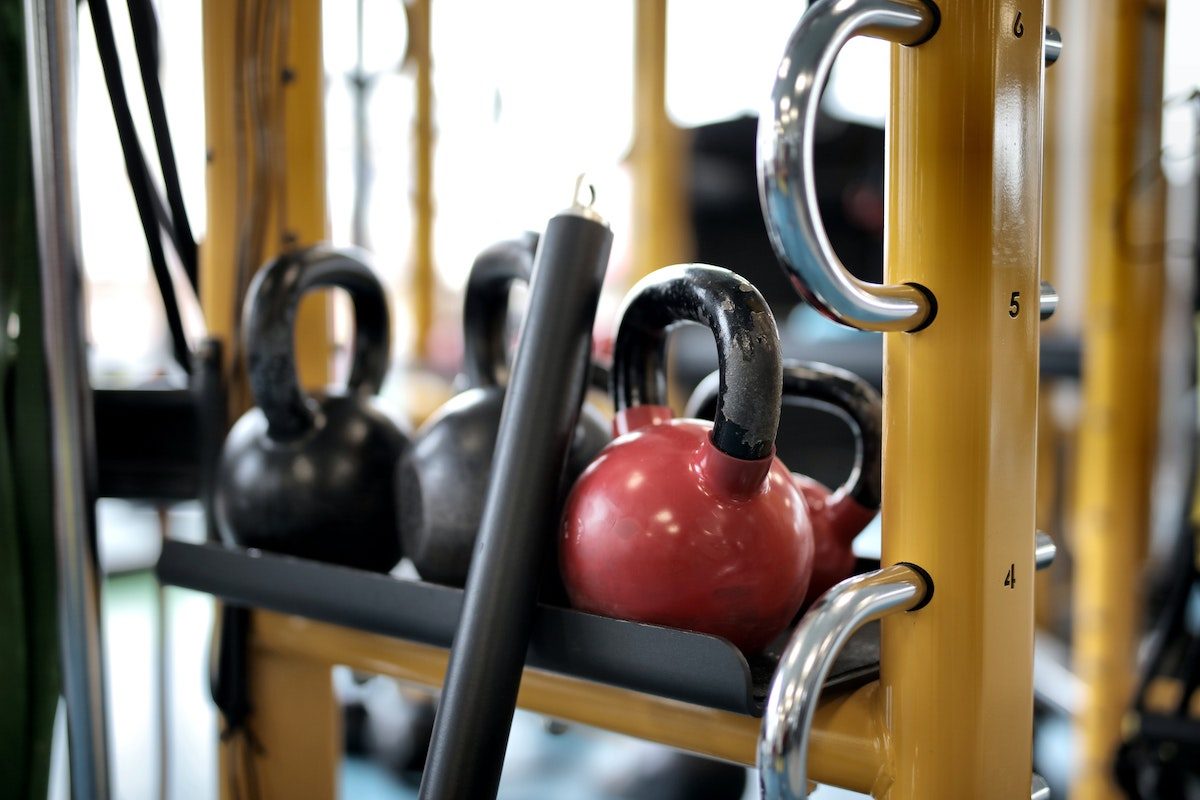 kettlebells on a small rack at a gym