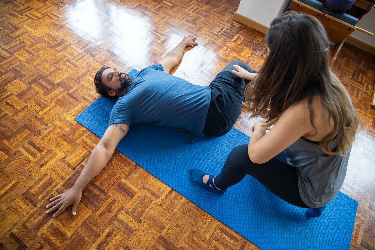 man doing supine twist