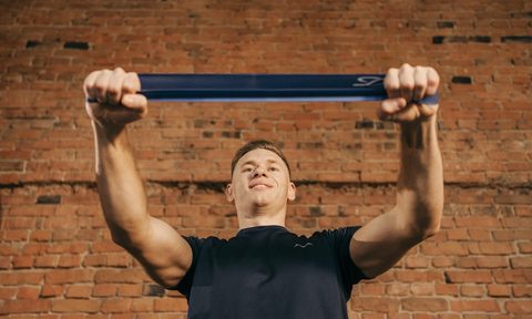 Man with blue resistance band