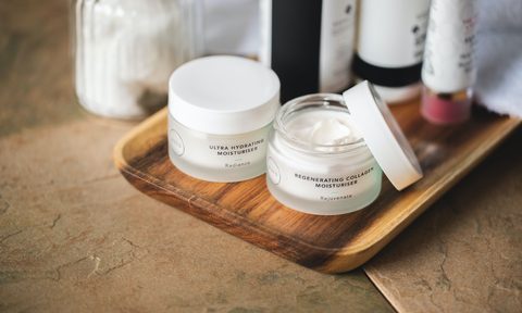 Moisturizing cream on cutting board