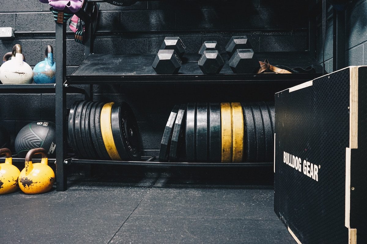a rack of weights at a gym