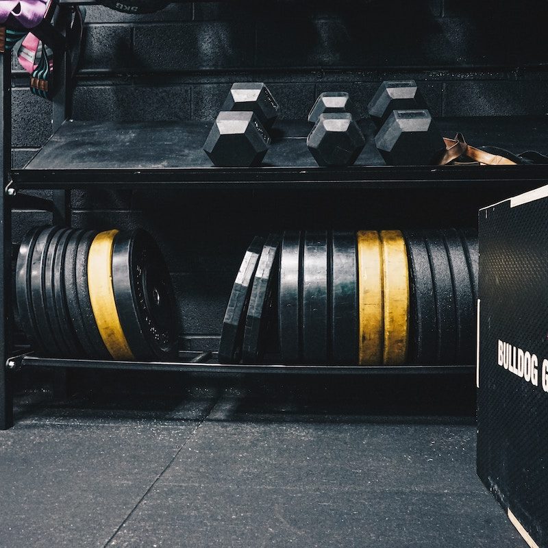 a rack of weights at a gym
