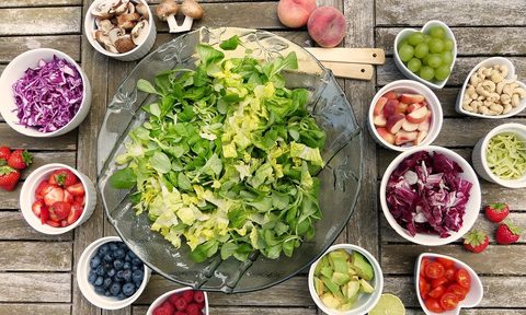 Table of healthy foods in small bowls