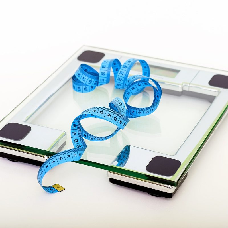 Scale with measuring tape on top