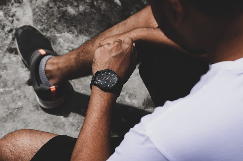 Man sitting down after a run.