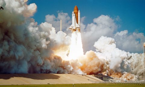 Space Shuttle Challenger launching from Launchpad 39.
