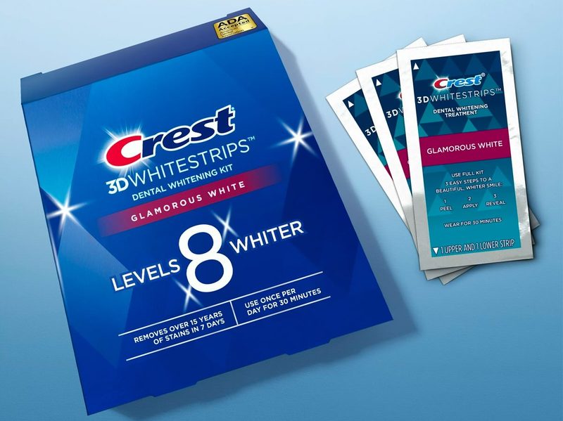 The Crest 3D Whitestrips Glamorous White 28-pack against a blue background.