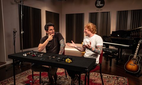 Ed Sheeran with a table full of watches