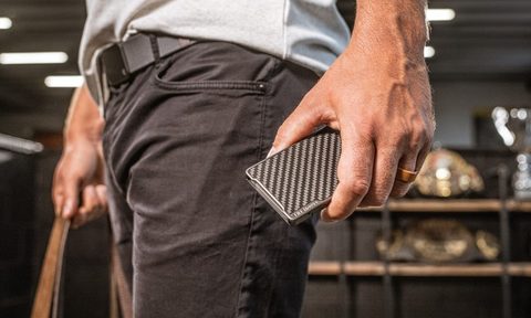 Groove Life Wallet in man's hand