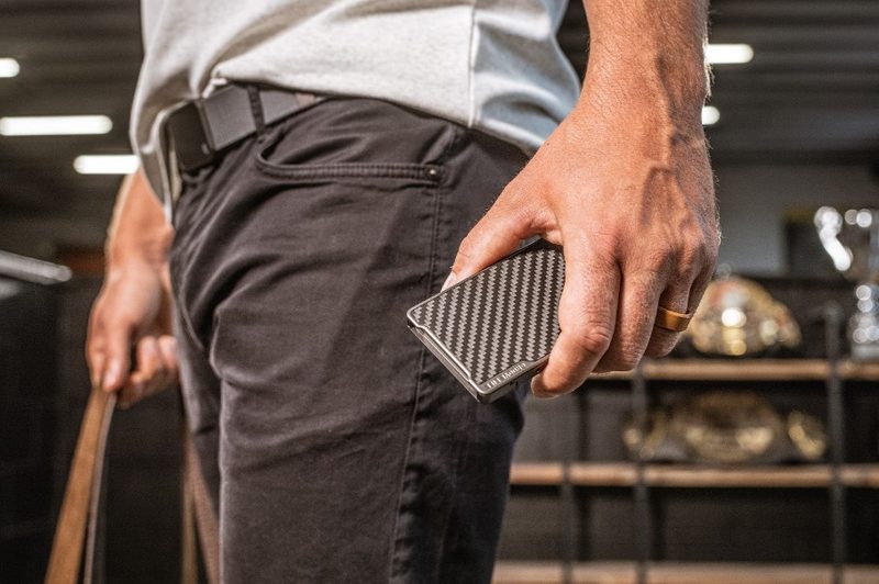 Groove Life Wallet in man's hand