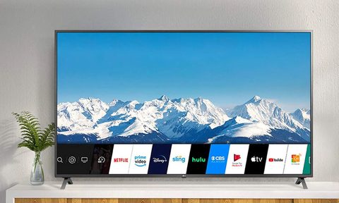 An LG TV on a media stand.